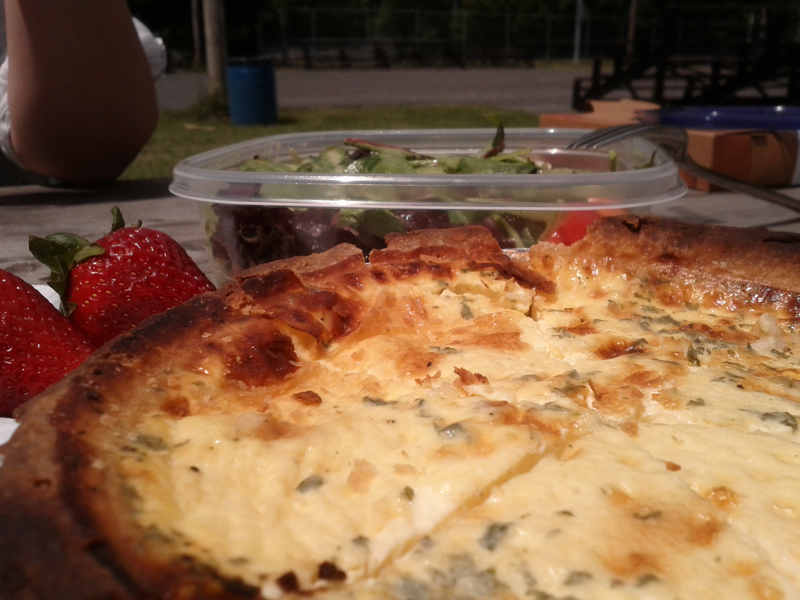 Quiche, green salad, and Strawberries for lunch
