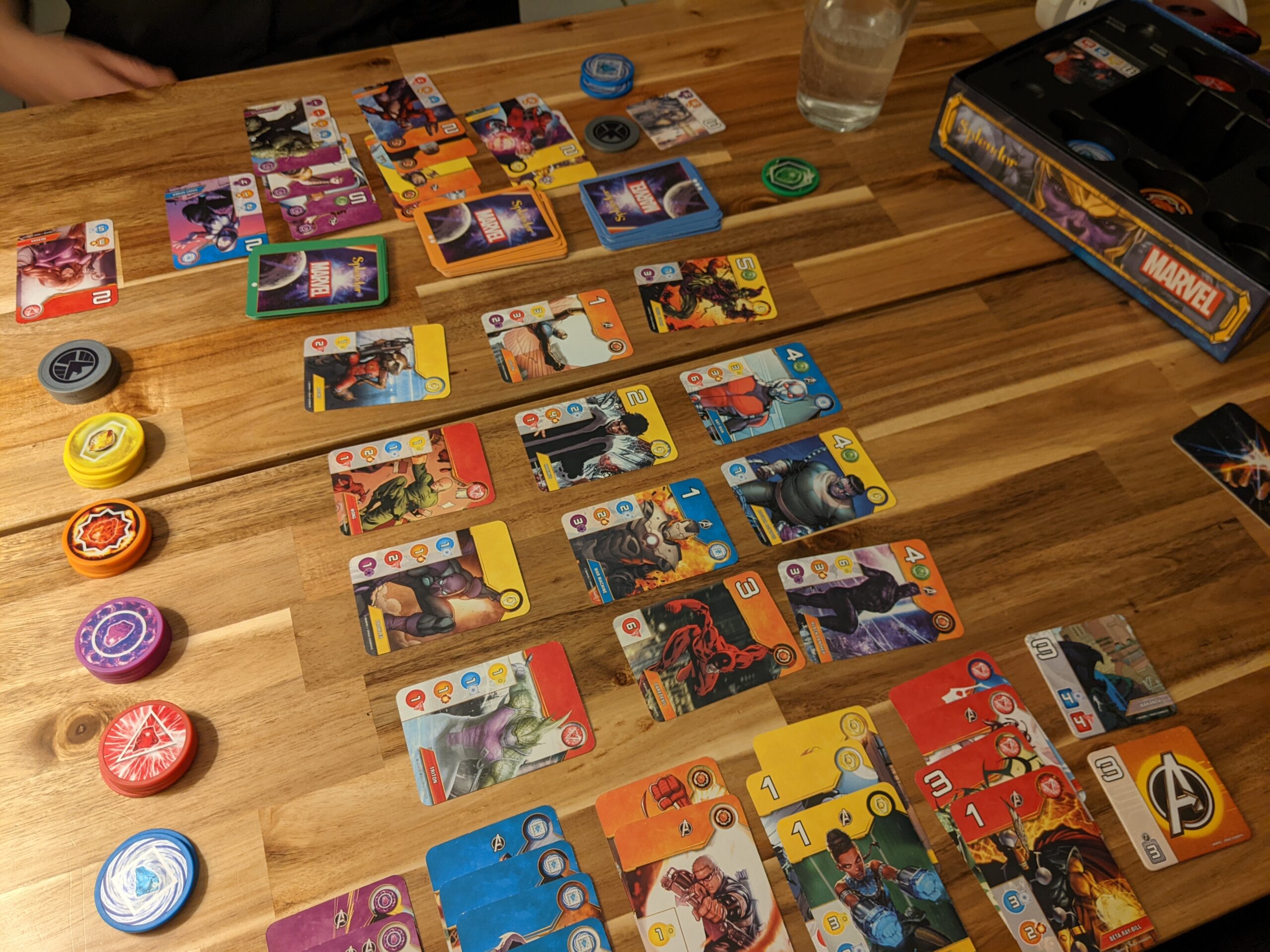 The Splendor Marvel board game, seen from above.